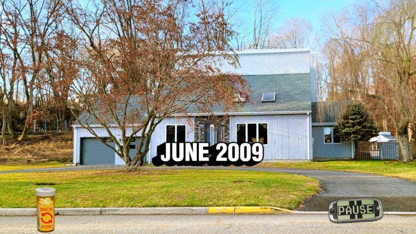 A view of the outside of a house set during June 2009